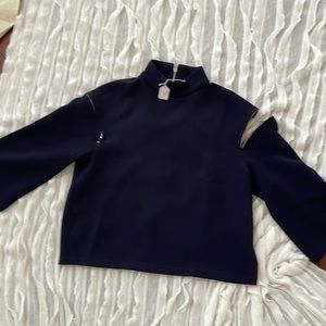 Zip neck and shoulder top